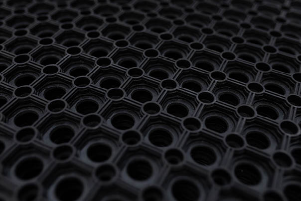 black rubber floor mat close-up.